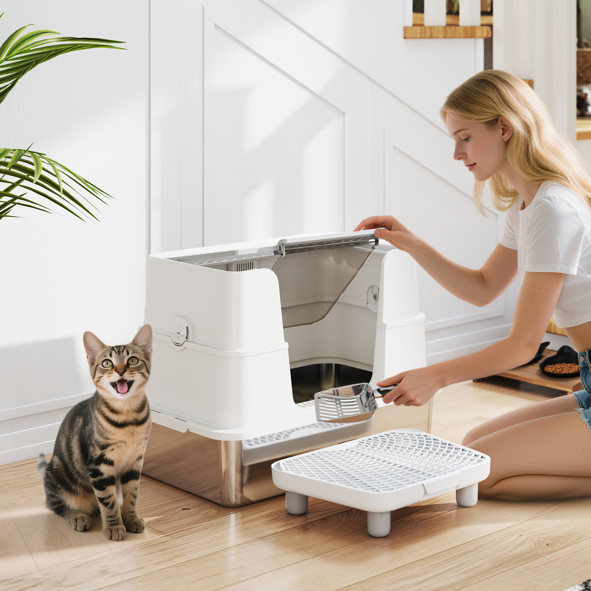 Light Gray Ailurova XL enclosed cat litter box in a living room with a cat beside it